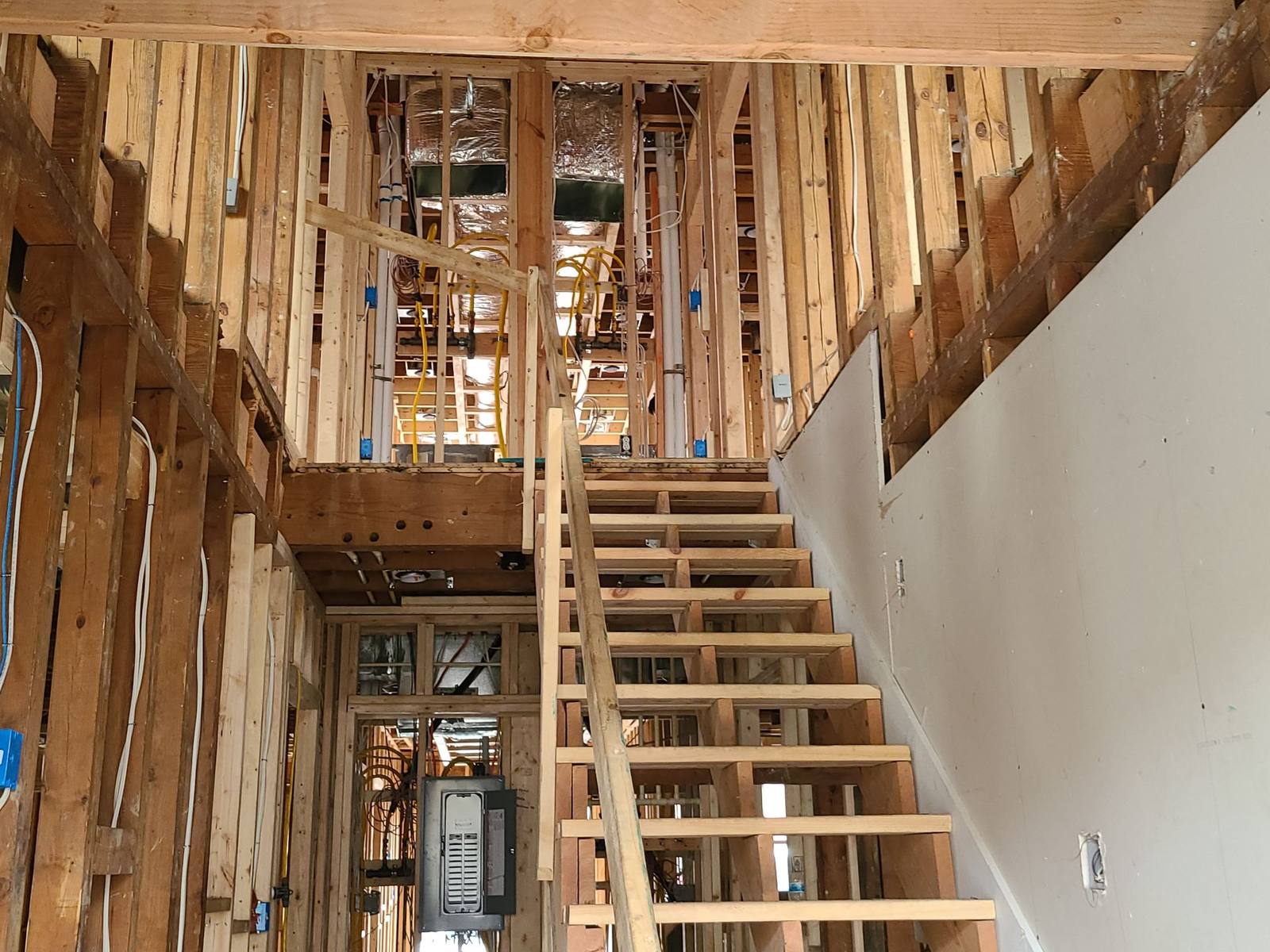 New stair framing during a full-gut renovation